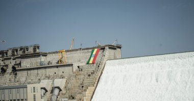 The Ethiopian national flag is seen at the Grand Ethiopian Renaissance Dam (GERD) in Guba, Ethiopia, Feb. 19, 2022. (AFP Photo)