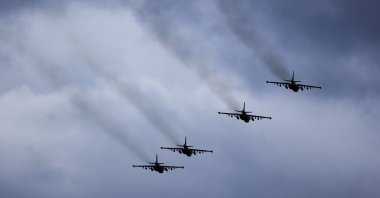 Military jets fly during the Union Courage-2022 Russia-Belarus military drills at the Obuz-Lesnovsky training ground in Belarus, Feb. 19, 2022. (AP Photo)