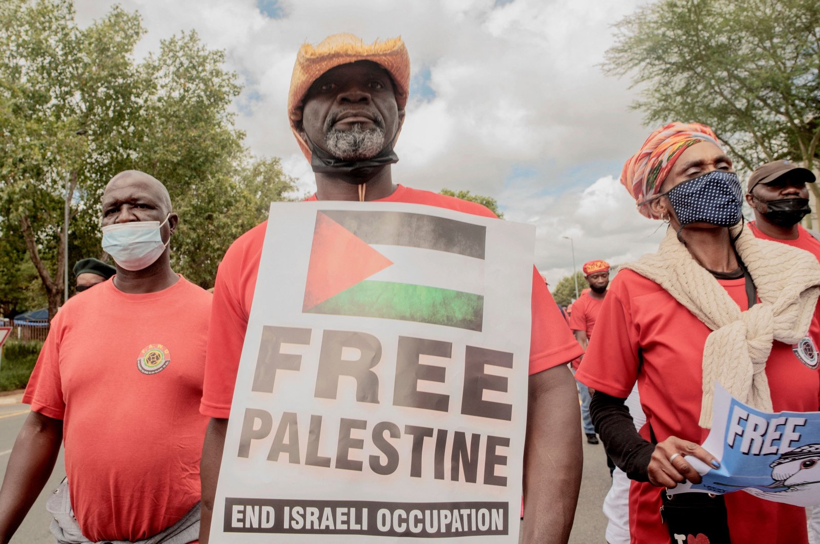 Members of General Industrial Workers Union of South Africa (GIWUSA), civil associations and political parties hold anti-Israel banners during a pro-Palestine demonstration in front of the Israeli Trade and Economic Office in Sandton, Johannesburg, Jan. 27, 2022. (AFP File Photo)