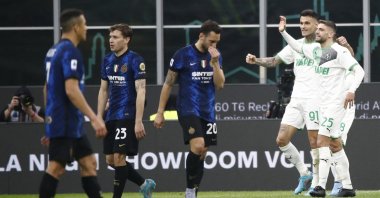 Sassuolo players celebrate a goal in a Serie A match against Inter Milan at the San Siro, Milan, Italy, Feb. 20, 2022.
