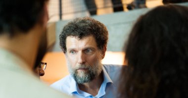 This undated handout photograph released on Oct. 15, 2021, by the Anadolu Culture Center shows Osman Kavala speaking during an event in Istanbul, Turkey. (AFP Photo)