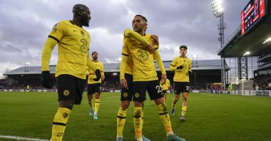 Chelsea players celebrate with Hakim Ziyech (C) after he scored a goal in a Premier League match against Crystal Palace, London, Feb. 19, 2022. (AP Photo)
