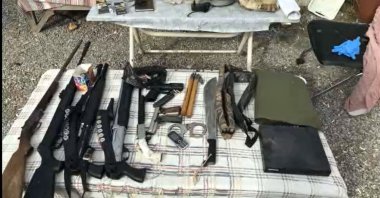 An image shows items found by police at suspect B.K.&#039;s addresses, Turkey, Feb. 21, 2022. (DHA Photo)