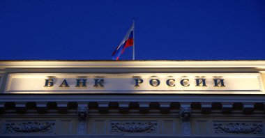 A Russian state flag flies over the Central Bank headquarters in Moscow, Russia March 29, 2021. (Reuters Photo)