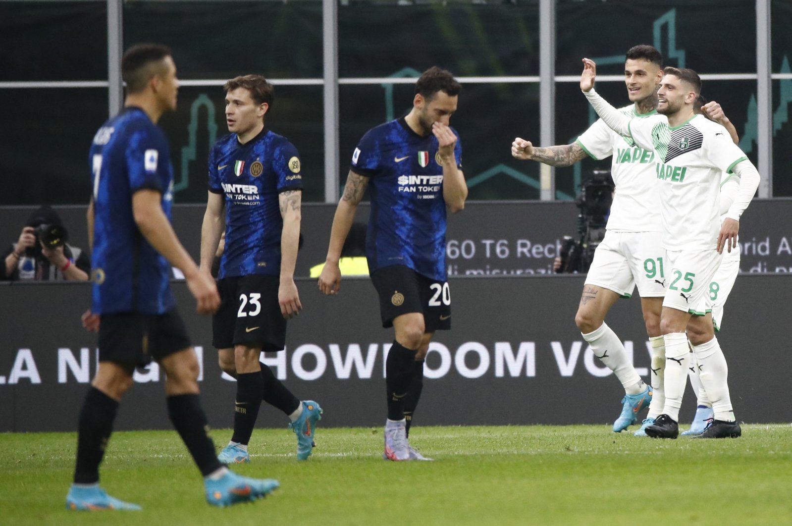 Sassuolo players celebrate a goal in a Serie A match against Inter Milan at the San Siro, Milan, Italy, Feb. 20, 2022.