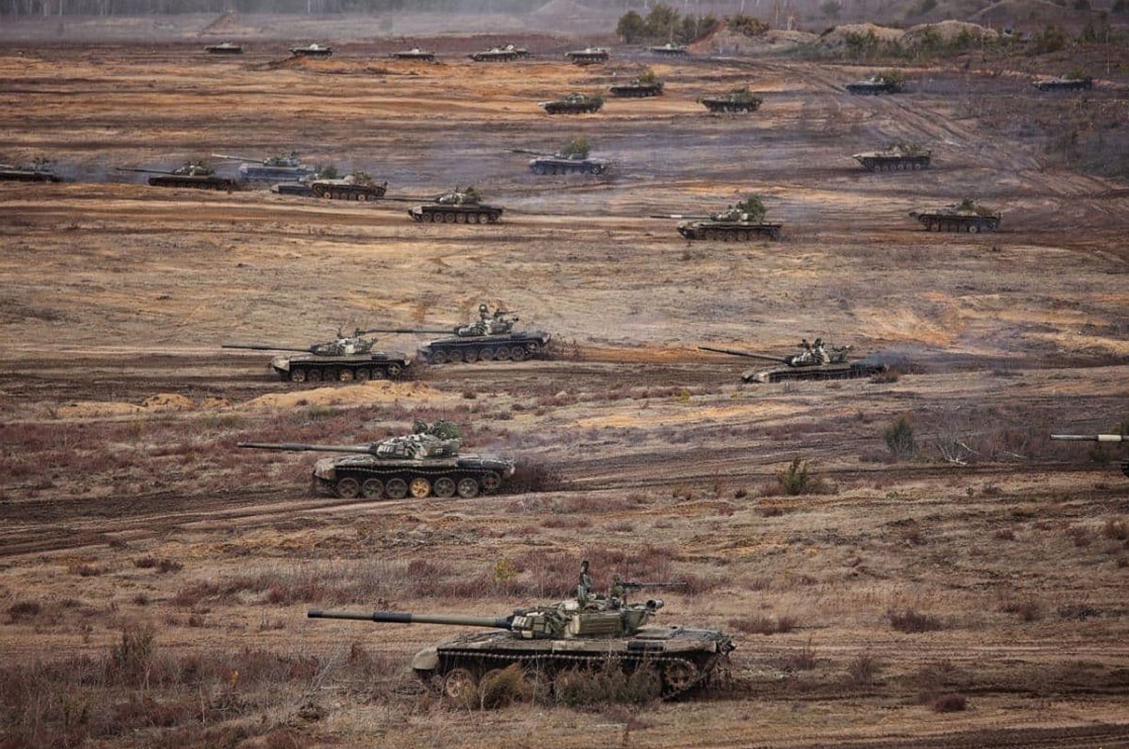 This handout video grab taken by the Belarussian Defence Ministry on Feb. 19, 2022 and released on Feb. 20, 2022, shows tanks during joint exercises of the armed forces of Russia and Belarus as part of an inspection of the Union State&#039;s Response Force, at a firing range near Brest. (AFP Photo)