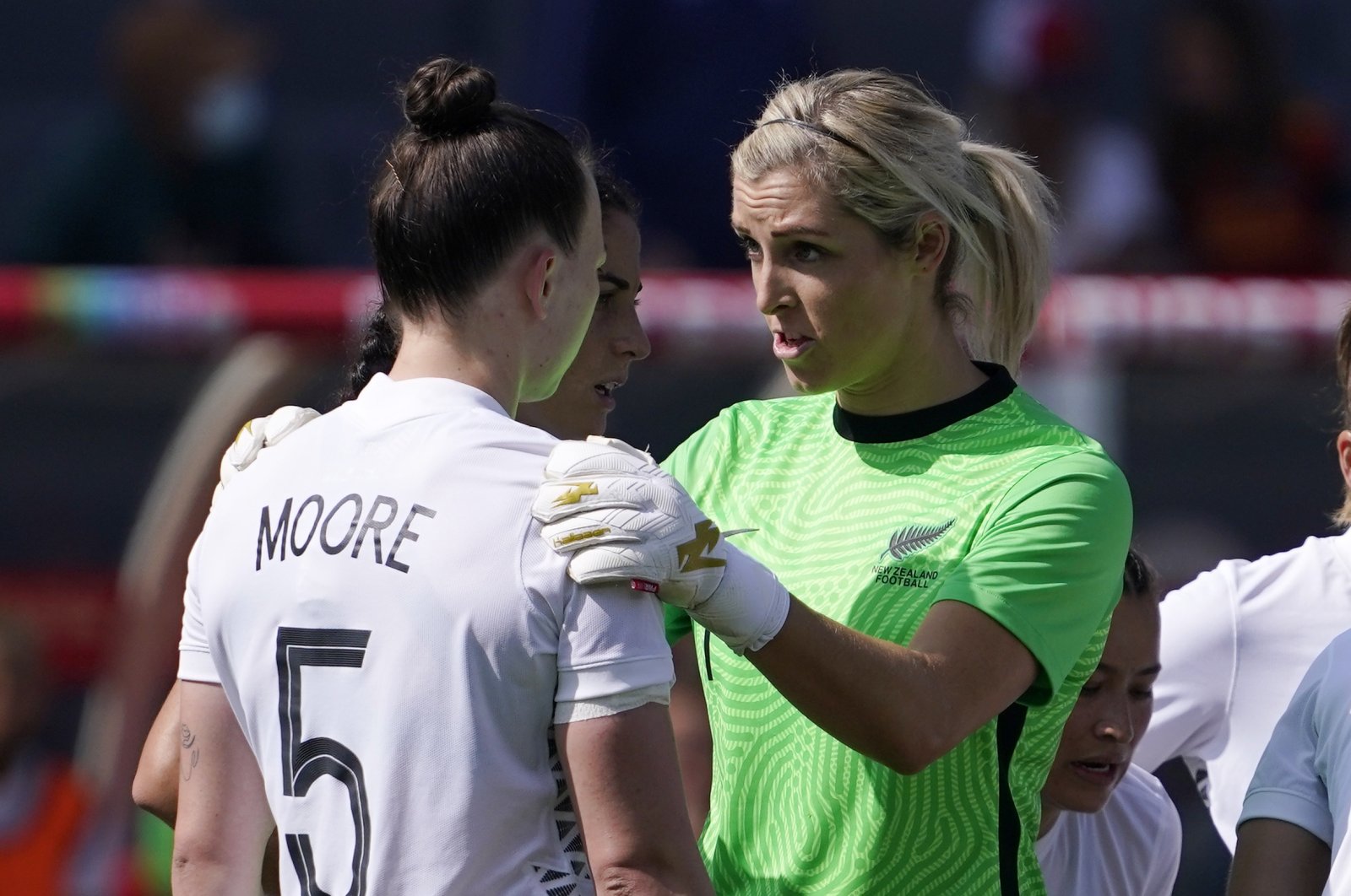 New Zealand goalkeeper Erin Nayler (R) talks to defender Meikayla Moore after an own goal during a 2022 SheBelieves Cup match against the U.S., Carson, California, Feb. 20, 2022. (AP Photo)