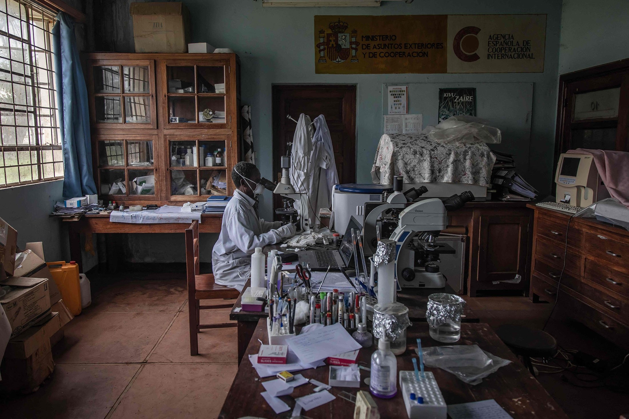 Damien Mangura, analyzes the samples of the primates that are in the Lwiro Primate Rehabilitation Center, in Lwiro, eastern Democratic Republic of Congo, Feb. 14, 2022. (AFP Photo)