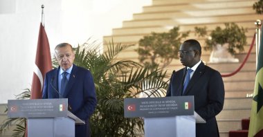 President Recep Tayyip Erdoğan (L) holds a joint press conference with his host, Senegalese President Macky Sall, following their meeting at the Palais de la Republique, in Dakar, Senegal, Feb. 21, 2022. (AFP Photo)