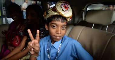 Indian prodigy Rameshbabu Praggnanandhaa poses for a photo after becoming the world&#039;s second youngest chess grandmaster ever, Chennai, India, June 26, 2018. (AFP Photo)
