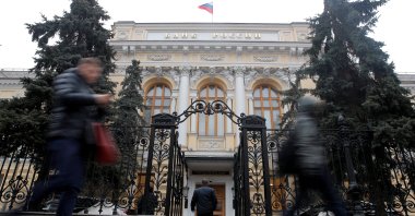 People walk past the Central Bank headquarters in Moscow, Russia, Feb. 11, 2019. (Reuters Photo)