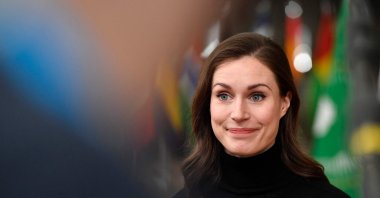 Finland Prime Minister Sanna Marin addresses media representatives as she arrives for the second day of a European Union (EU) African Union (AU) summit at The European Council Building in Brussels, Belgium, Feb.18, 2022. (AFP Photo)