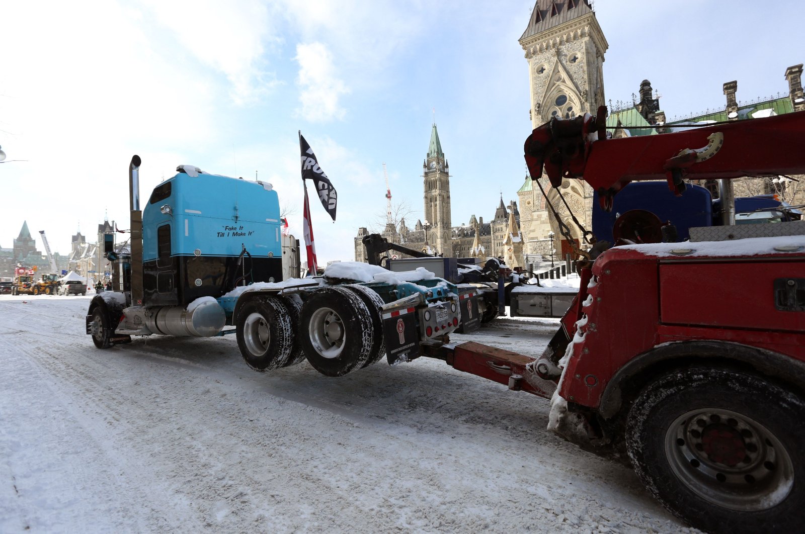 A protester&amp;#039;s truck is towed away after police cleared the street of demonstrators in Ottawa, Ontario, Canada, Feb. 19, 2022. (AFP Photo)