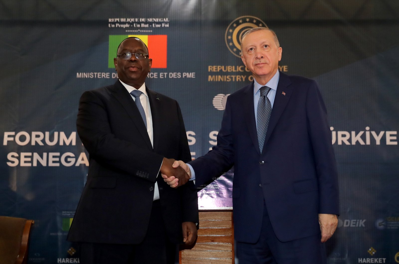 President Recep Tayyip Erdoğan and Senegal&#039;s President Macky Sall shake hands during the Senegal-Turkey Business Forum in Dakar, Senegal, Feb. 21, 2022. (Presidential Press Office via EPA)