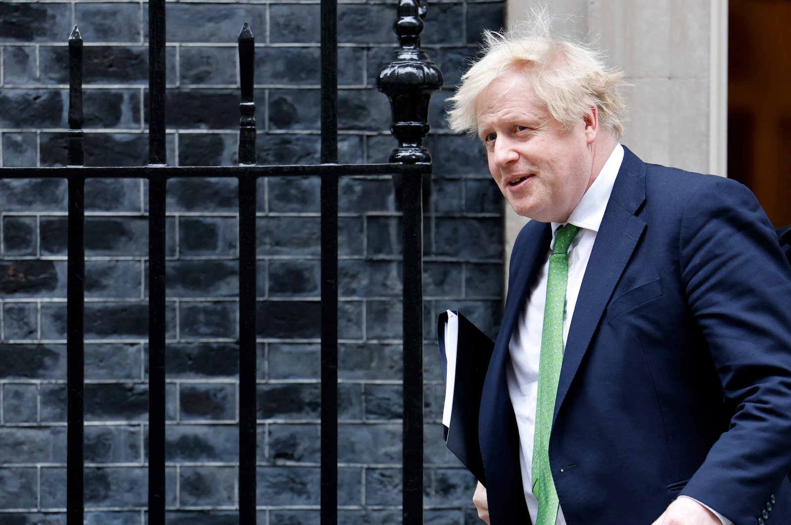Britain&#039;s Prime Minister Boris Johnson leaves from 10 Downing Street in central London to make a statement on the situation in Ukraine to lawmakers at the Houses of Parliament, Britain, Feb. 22, 2022. (AFP Photo)