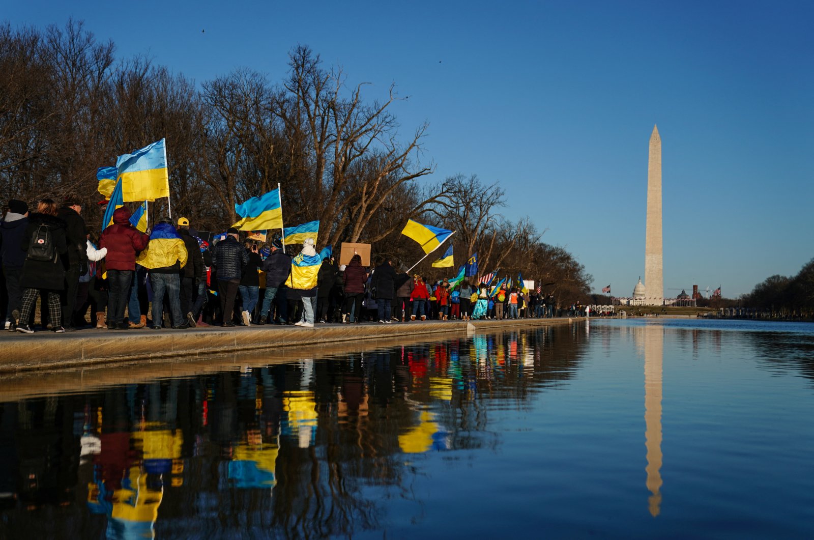 Demonstrators march along the National Mall from the Lincoln Memorial to the White House during a "Stand with Ukraine" rally in Washington, U.S., Feb. 20, 2022. (Reuters Photo)