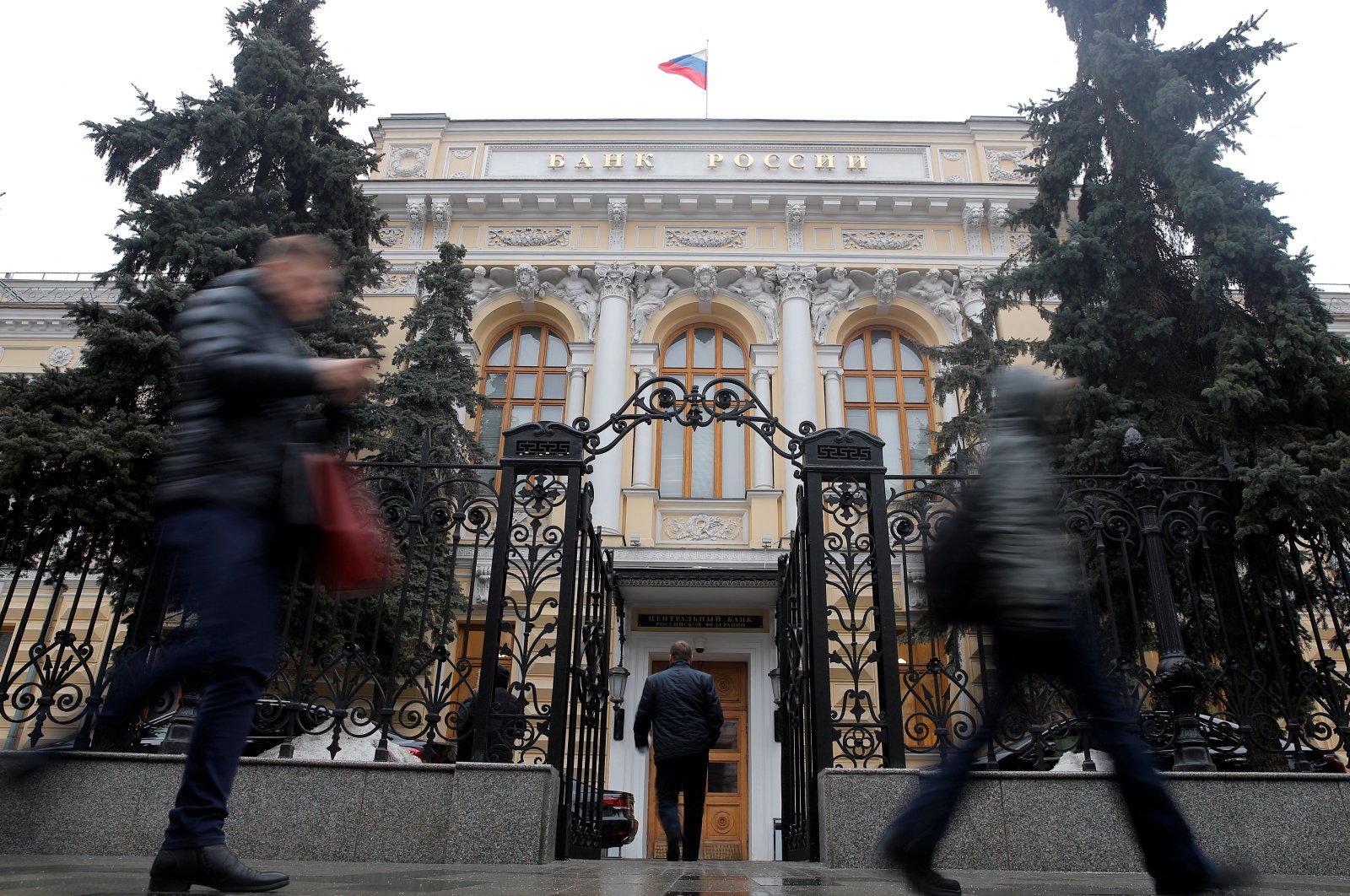 People walk past the Central Bank headquarters in Moscow, Russia, Feb. 11, 2019. (Reuters Photo)