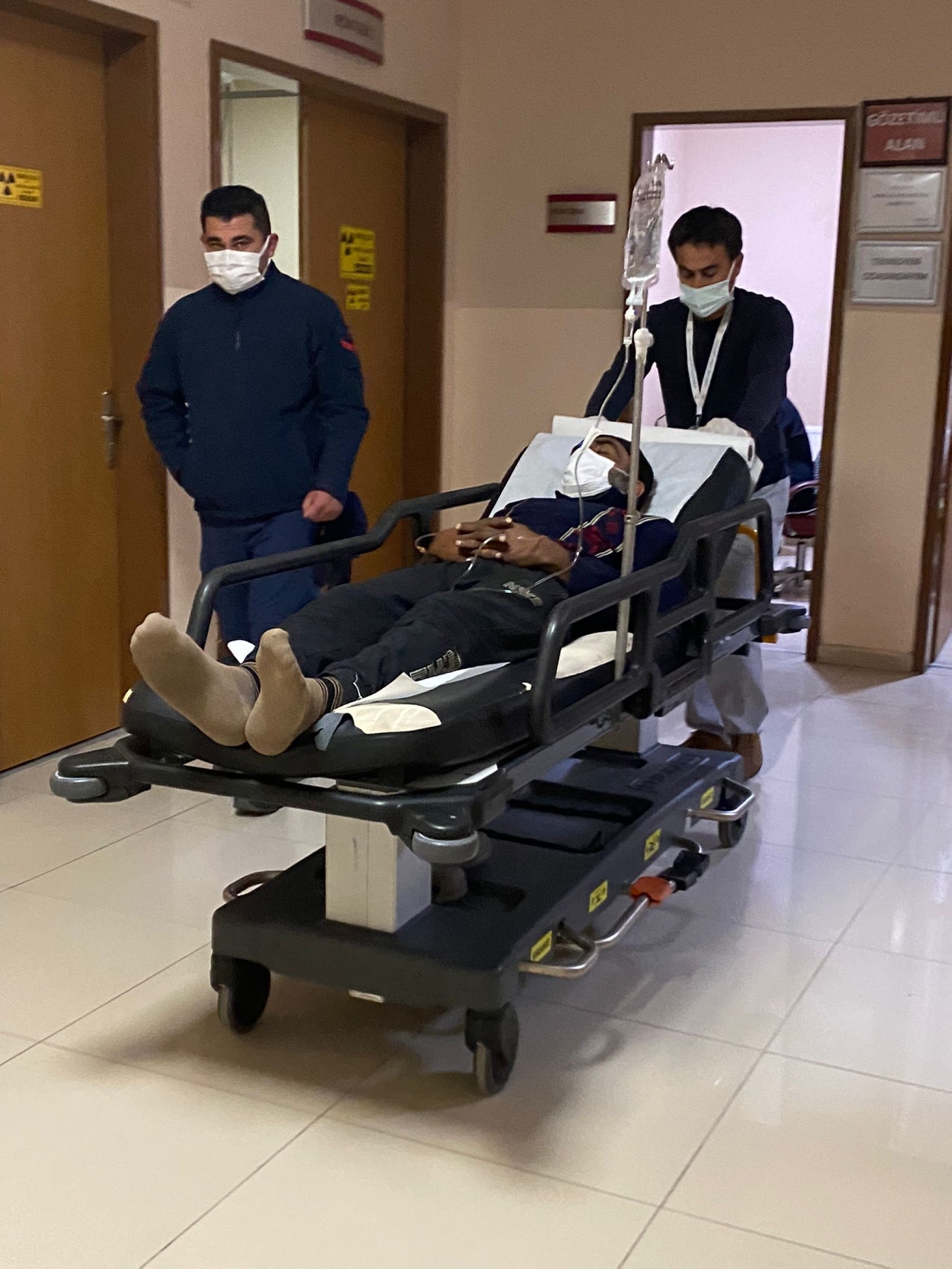The fisherman injured due to Greek fire is being transferred to Çeşme State Hospital, Çeşme, Izmir, Turkey, Feb. 22, 2022. (AA Photo)