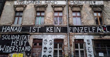 The words &quot;Hanau ist kein Einzelfall&quot; (Hanau is not an isolated event) are painted on the facade of a squatted building in Berlin, Germany, Feb. 22, 2022. (AFP Photo)