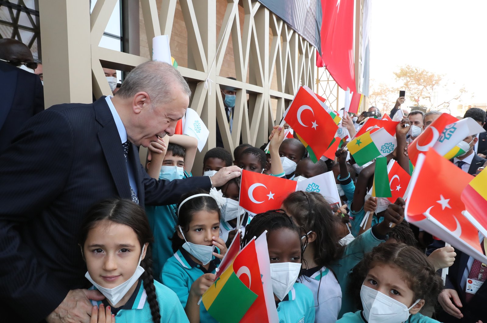President Recep Tayyip Erdoğan with children during the inauguration ceremony of an official building of Turkey&#039;s Dakar Embassy, in Dakar, Senegal, Feb. 2, 2022. (AA Photo)
