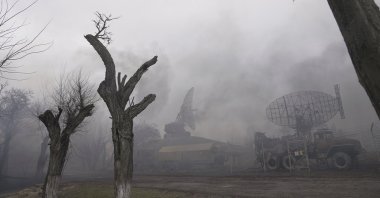 Smoke rises from an air defense base in the aftermath of an apparent Russian strike in Mariupol, Ukraine, Thursday, Feb. 24, 2022. (AP Photo)