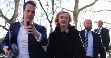 British Foreign Secretary Liz Truss leaves after an interview in Westminster, London, Britain, Feb. 23, 2022. (REUTERS)