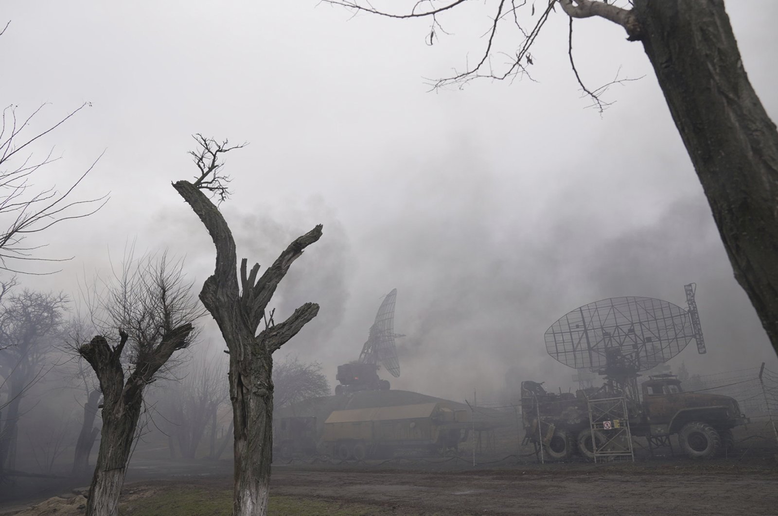 Smoke rises from an air defense base in the aftermath of an apparent Russian strike in Mariupol, Ukraine, Thursday, Feb. 24, 2022. (AP Photo)