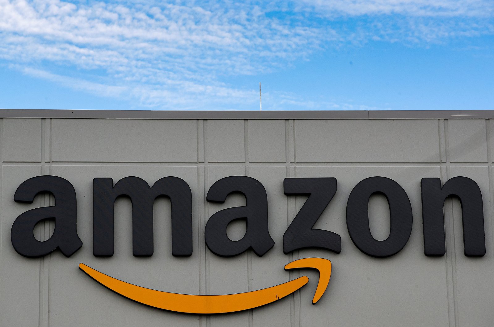 The Amazon logo is seen outside its JFK8 distribution center in Staten Island, New York, U.S., Nov. 25, 2020. (Reuters Photo)