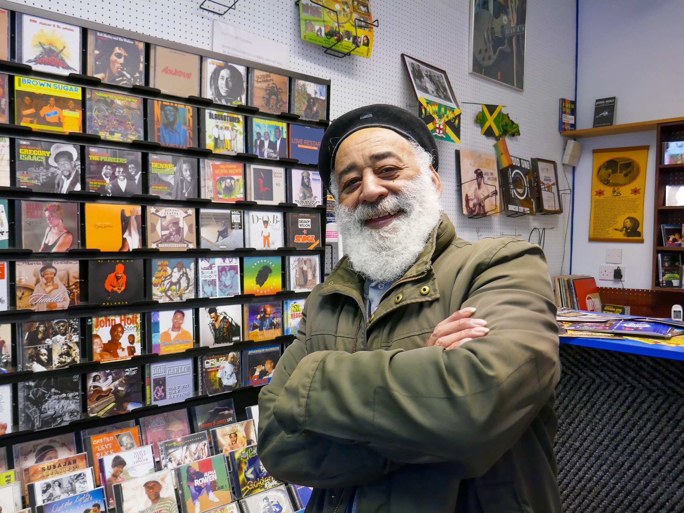 Popsie Deer, the owner of Starlight Records, who used to go on tour with Bob Marley, poses at his shop. (dpa Photo)