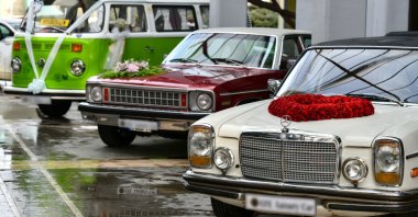 Three cars decorated with flowers for the wedding at a festival organized by Ankara Metropolitan Municipality at ANFA Altınpark Fair and Congress Center, Ankara, Turkey, Feb. 25, 2022. (IHA Photo)