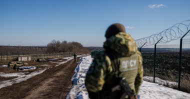Ukrainian frontier guards patrol an area along the Ukrainian-Russian border in the Kharkiv region, Ukraine Feb. 23, 2022. (Reuters Photo)