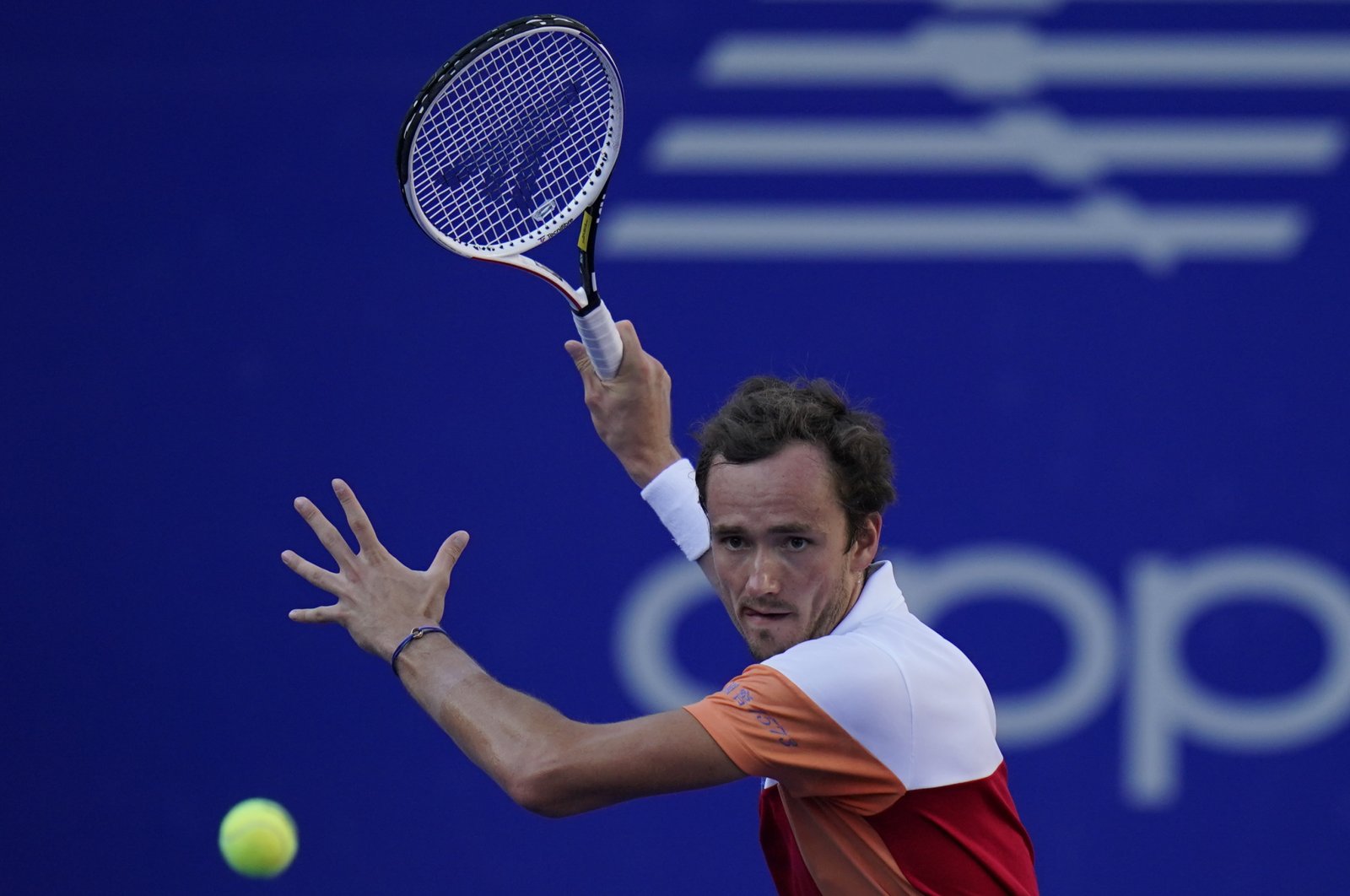 Daniil Medvedev returns a ball during a match against Yoshihito Nishioka at the quarterfinal at the Mexican Open tennis tournament in Acapulco, Mexico, Feb. 24, 2022. (AP Photo)
