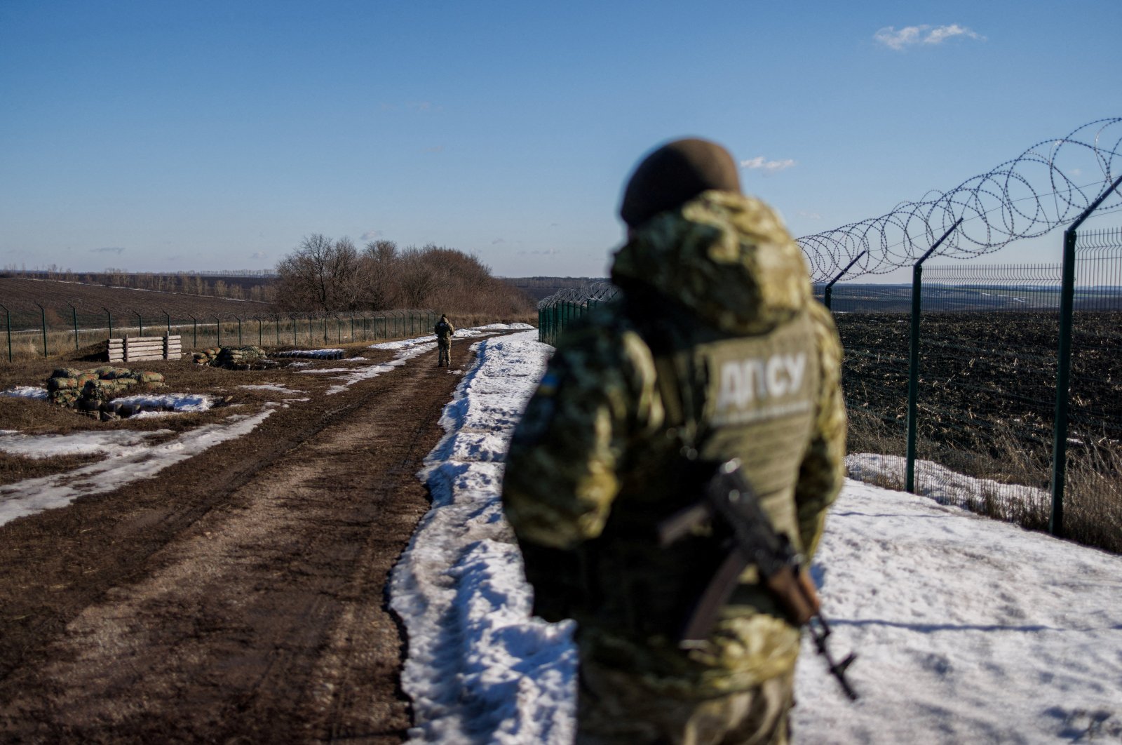Ukrainian frontier guards patrol an area along the Ukrainian-Russian border in the Kharkiv region, Ukraine Feb. 23, 2022. (Reuters Photo)