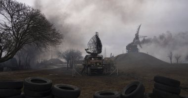 Smoke rises from an air defence base in the aftermath of an apparent Russian strike in Mariupol, Ukraine, Feb. 24, 2022. (AP Photo)