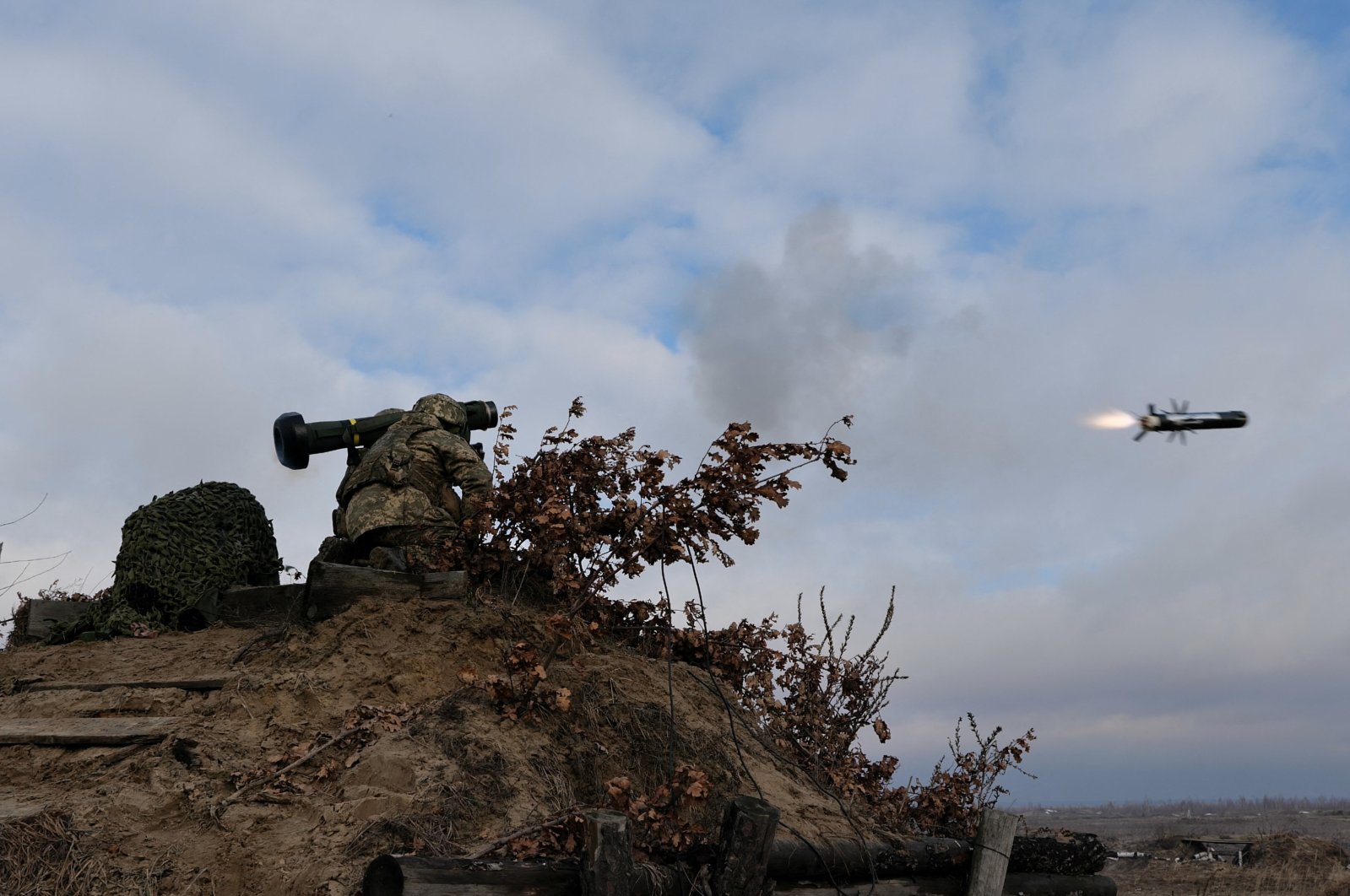 Service members of the Ukrainian Armed Forces fire a Javelin anti-tank missile during drills at a training ground in an unknown location in Ukraine, in this handout picture released Feb. 18, 2022. (Reuters Photo)