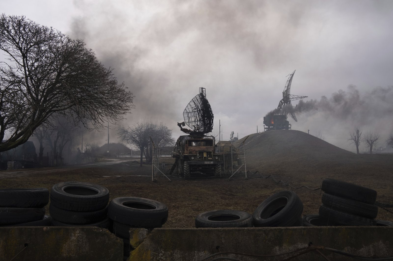 Smoke rises from an air defence base in the aftermath of an apparent Russian strike in Mariupol, Ukraine, Feb. 24, 2022. (AP Photo)