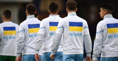 Manchester City players wear t-shirts in support of Ukraine before a Premier League match against Everton, Liverpool, Feb. 26, 2022. (Reuters Photo)