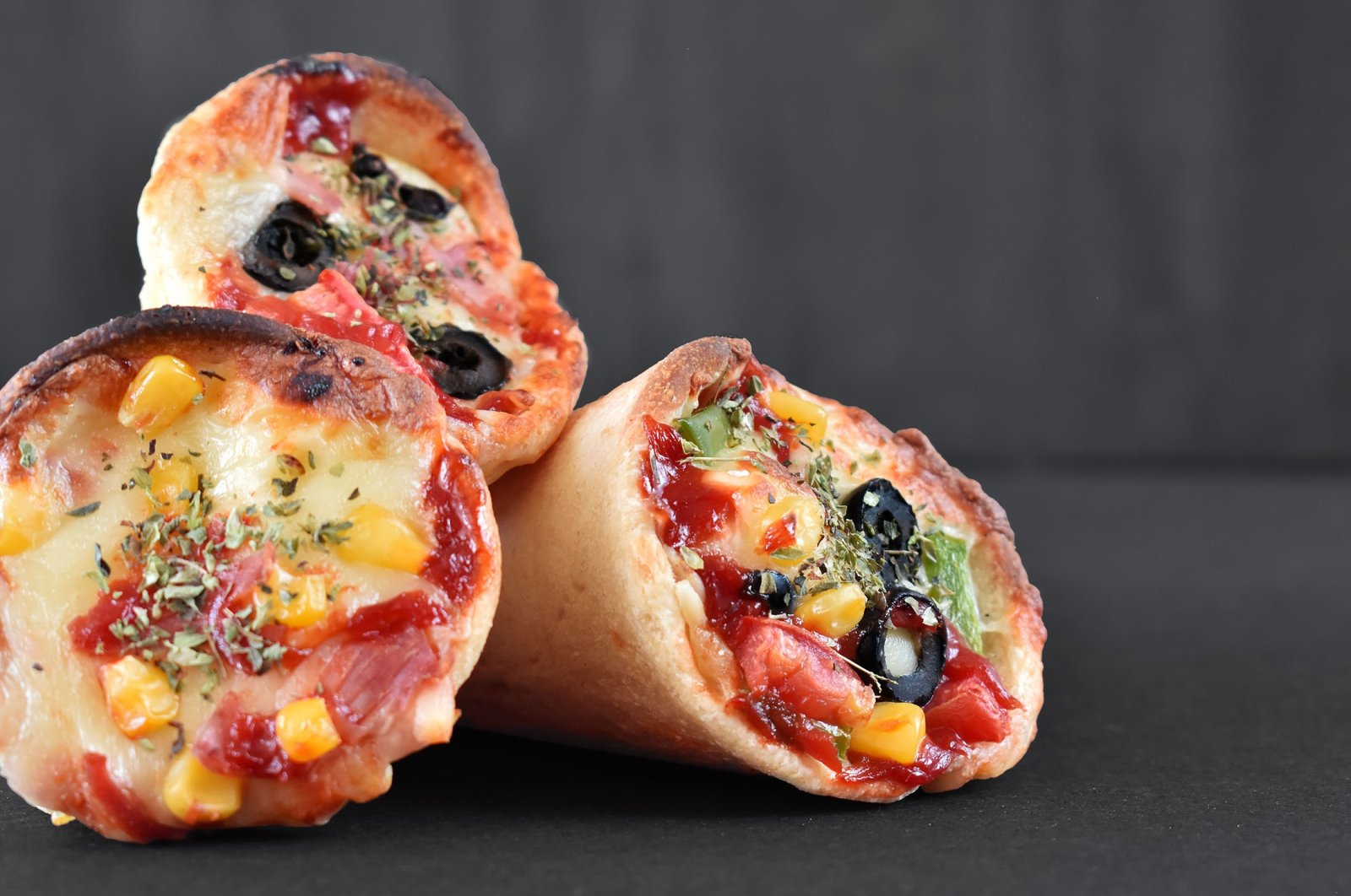 Pizza cones are unconventional for sure, but they can be organic and delicious. (Shutterstock Photo)