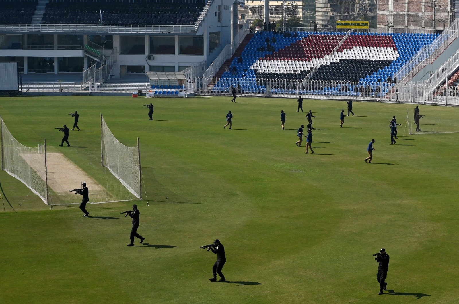 Security personnel conduct a drill at the Rawalpindi Cricket Stadium, Rawalpindi, Pakistan, Feb. 27, 2022. (AFP Photo)