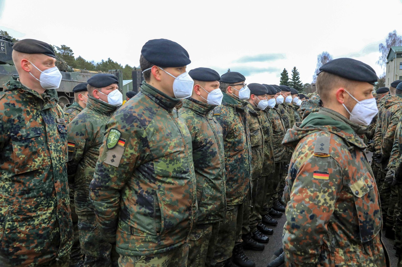 Soldiers of the German armed forces Bundeswehr take part in a ceremony during the visit of the German Defense Minister at the leadership of the NATO&#039;s Enhanced Forward Presence (EFP) battlegroup in Rukla, Lithuania, Feb.  22, 2022. (AFP Photo)