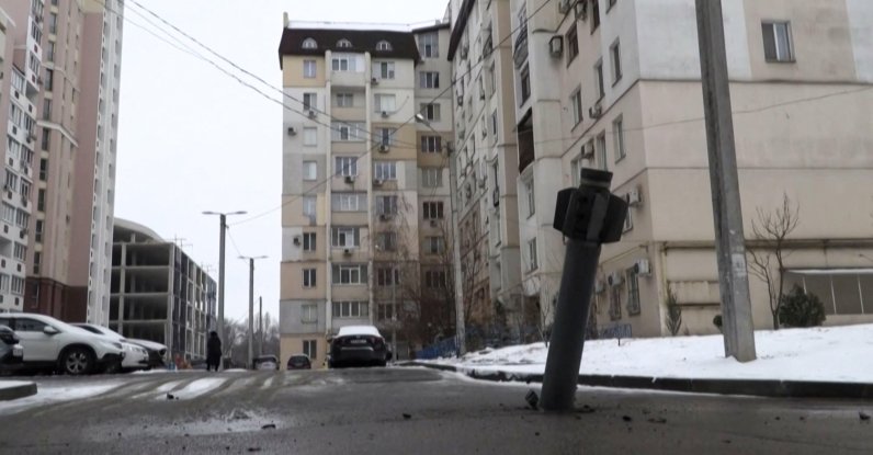 This video grab taken from a RFE/RL footage shows the tail section of a missile that hit a residential area of the city of Kharkiv, Ukraine, Feb. 25, 2022. (Photo by Radio Free Europe/Radio Liberty/AFP)