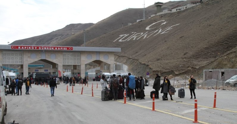 Iranian tourists are seen at the Kapıköy Border Gate in eastern Van province near the Iranian border, Turkey, Feb. 26, 2021. (DHA Photo)