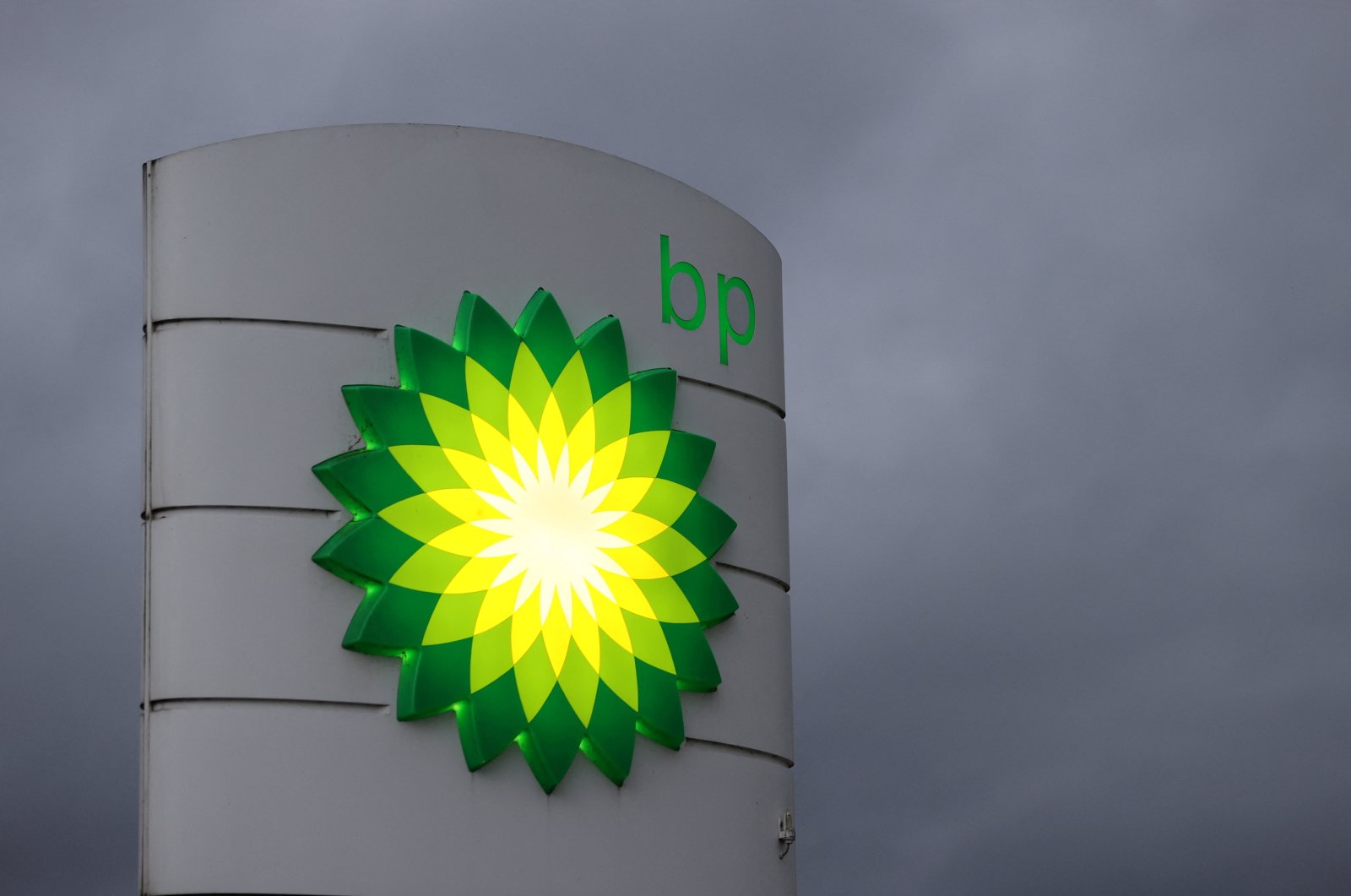 An illuminated BP logo is seen at a petrol station in Gateshead, Britain, Sept. 23, 2021. (Reuters Photo)