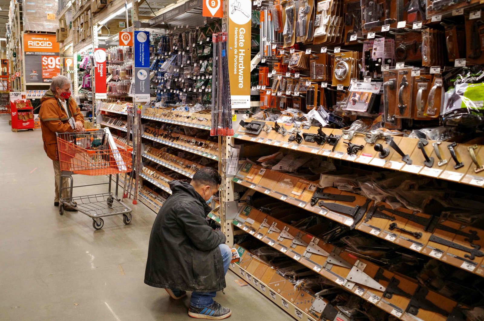 Shoppers looks at items on shelves at a home improvement store in Bethesda, Maryland, U.S., Feb. 17, 2022. (AFP Photo)