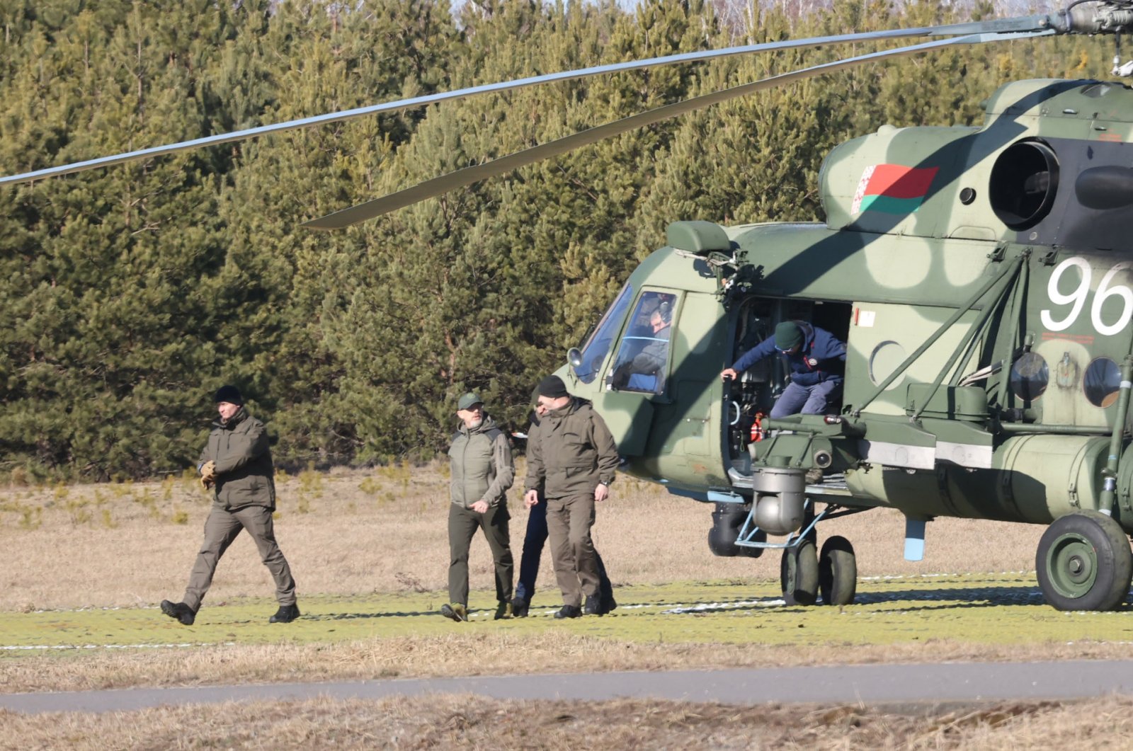 Ukrainian Defence Minister Oleksii Reznikov (2L) arrives to attend the talks between delegations from Ukraine and Russia in Belarus' Gomel region on February 28, 2022, following the Russian invasion of Ukraine. (AFP Photo)