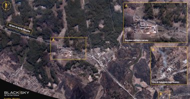 A satellite image collected over Ivankiv shows a Russian military convoy passing through scorched countryside, northwest of Kyiv, Ukraine Feb. 28, 2022.  (Blacksky/Handout via Reuters) 