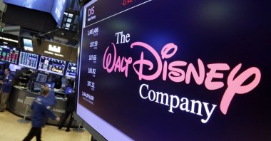 In this Aug. 8, 2017, photo, the Walt Disney Co. logo appears on a screen above the floor of the New York Stock Exchange. (AP)
