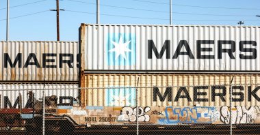 Maersk shipping containers sit on rail cars at the Port of Los Angeles, California, U.S., Feb. 9, 2022. (AFP Photo)