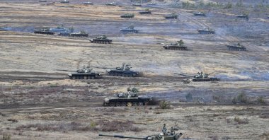 Tanks move during the Union Courage-2022 Russia-Belarus military drills at the Obuz-Lesnovsky training ground in Belarus, Feb. 19, 2022. (AP Photo)