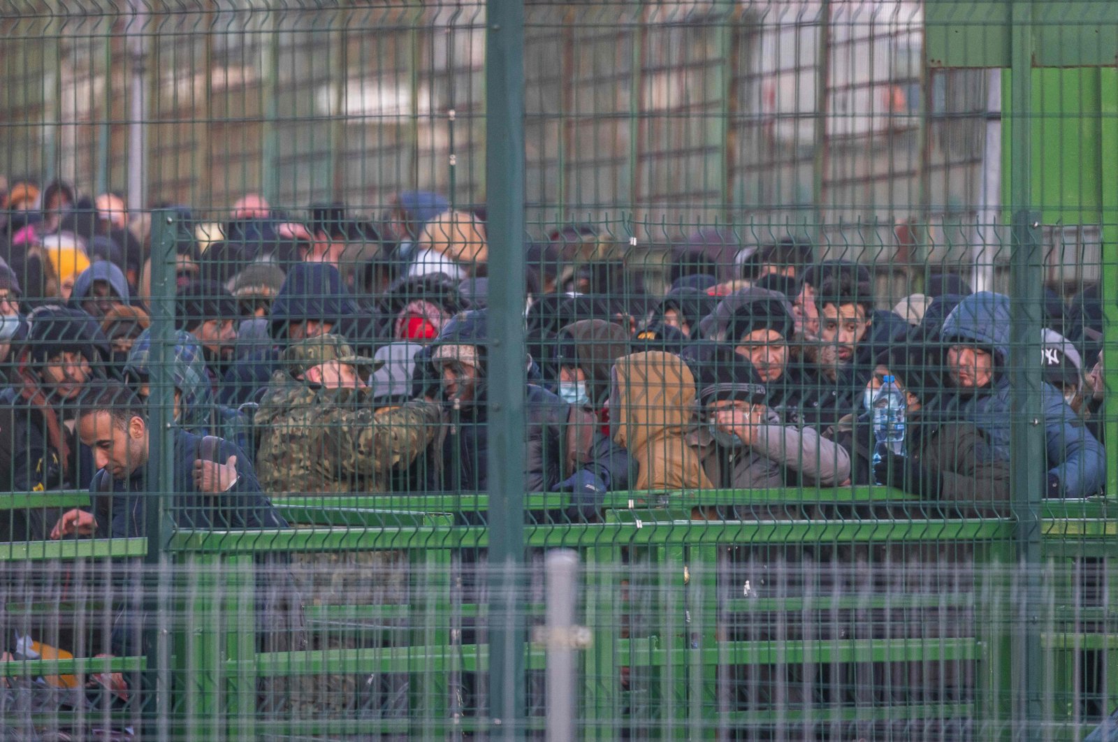 Refugees from Ukraine line up to get into Poland on border crossing in Medyka, in eastern Poland on Feb. 28, 2022. (AFP Photo)